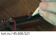 Precise Soldering of FPV Drone Wiring. Стоковое видео, видеограф Поскребышев Михаил / Фотобанк Лори