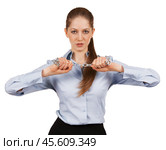 Young woman trying to break a metal chain. Стоковое фото, фотограф Дмитрий Киселёв / Фотобанк Лори
