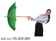 Girl pulls to itself open umbrella. Стоковое фото, фотограф Дмитрий Киселёв / Фотобанк Лори