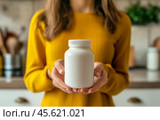 The girl advertises Biologically active additives, medicines. A white jar is in the young woman's hand. Стоковое AI-изображение, AI-художник Ирина Ручушкина / Фотобанк Лори