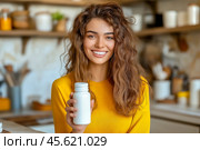 The girl advertises Biologically active additives, medicines. A white jar is in the young woman's hand. Стоковое AI-изображение, AI-художник Ирина Ручушкина / Фотобанк Лори