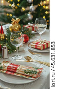 Christmas table setting appearing on white tablecloth. Стоковое AI-видео, аниматор Юрий Поздников / Фотобанк Лори