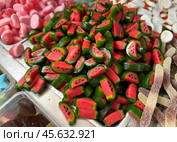 A counter with watermelon-shaped candies. Стоковое фото, фотограф Irina Opachevsky / Фотобанк Лори