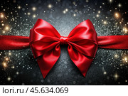 Elegant bow made of satin red ribbon on a shiny black background. Стоковое AI-изображение, AI-художник Photojuli / Фотобанк Лори