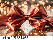 Elegant bow made of satin red ribbon on a shiny black background. Стоковое AI-изображение, AI-художник Photojuli / Фотобанк Лори