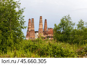 Pipes of old lime kilns on the abandoned marble and lime factory on a frosty January morning. Ruskeala, Karelia. Russia. Стоковое фото, фотограф Ольга Сейфутдинова / Фотобанк Лори