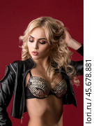 Sexy blonde in lingerie and jacket view. Стоковое фото, фотограф Гурьянов Андрей / Фотобанк Лори