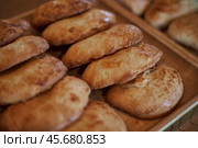 Sweetish Bakery pastry snack. Sochnik - Russian curd cake baked in the oven. Стоковое фото, фотограф Екатерина Якименко / Фотобанк Лори