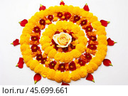 Marigold and rose flower rangoli decoration for diwali festival. Стоковое AI-изображение, AI-художник Иван Рябоконь / Фотобанк Лори