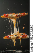 Gravity defying pizza slice with melting cheese in studio lighting. Стоковое AI-изображение, AI-художник Sabyna75 / Фотобанк Лори