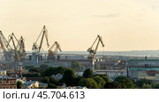 St. Petersburg, Russia, September 21, 2024: shipyards and port in St. Petersburg at sunset. Редакционное фото, фотограф Igor Skripachev / Фотобанк Лори