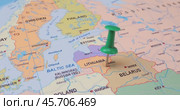 Lithuania - Travel concept with green pushpin on the world map. The location point on the map points to Vilnius the capital of the Lithuanian. Стоковое видео, видеограф Андрей Армягов / Фотобанк Лори
