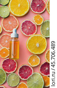 Vibrant citrus oils: dropping essence on sliced fruits for fresh aromas. Стоковое AI-видео, аниматор Sabyna75 / Фотобанк Лори