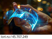 Engineer holding flexible transparent display screen. Стоковое AI-изображение, AI-художник Иван Рябоконь / Фотобанк Лори