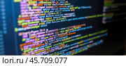 Colorful computer code on screen, programming language syntax highlighting, software development, coding, debugging, technology, digital data, IT, web development, script, lines of code. Стоковое фото, фотограф Павел Муравьев / Фотобанк Лори