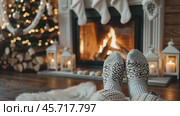 Cozy, warm feet in knitted gray socks by the glowing fireplace. Point of view. Charming winter ambiance. Closeup of legs in knit socks near fire stove in the wooden cabin, in rustic room or farmhouse. Стоковое AI-видео, аниматор Марина Демидюк / Фотобанк Лори