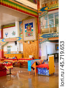 ULAN-UDE,  RUSSIA - AUGUST 11, 2024. A hall for reading Sutras and offerings in the Dugan building at Rinpoche Bagsha Datsan. Редакционное фото, фотограф Сергей Фролов / Фотобанк Лори