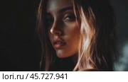 Woman with glowing skin enjoys serene moment in softly lit environment. Стоковое AI-видео, аниматор Ксения Лаптева / Фотобанк Лори