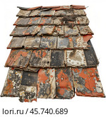 Damaged roof tiles showing wear, weathering, and neglect. Стоковое AI-изображение, AI-художник Иван Рябоконь / Фотобанк Лори