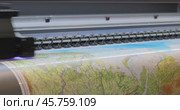 Modern Digital Large format UV printer. Printing production technologies. UV pinning is the process of applying a dose of low intensity ultraviolet light to a UV curable ink. Стоковое видео, видеограф Андрей Армягов / Фотобанк Лори