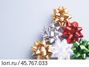 Festive Christmas ornaments on blue-grey background with text space. Стоковое фото, фотограф Юлия Трикашная / Фотобанк Лори
