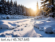 Восход солнца. Зимний пейзаж с незамерзающим ручьем. Sunrise. Winter landscape with unfrozen stream. Стоковое AI-изображение, AI-художник Гер Олег / Фотобанк Лори