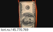 USA dollar bill money is burning in the fire, the concept of the economic crisis of inflation and currency devaluation. Стоковое видео, видеограф Андрей Армягов / Фотобанк Лори