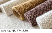 Boucle Fabric samples in various neutral colors close up arranged, texture detail, interior design palette background. Стоковое AI-изображение, AI-художник Анастасия Золотницкая / Фотобанк Лори