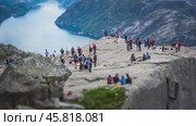 NORWAY- June 22, 2015: Preikestolen or Prekestolen, also known by the English translations of Preacher's Pulpit or Pulpit Rock, is a famous tourist attraction in Forsand, Ryfylke, Norway (2018 год). Стоковое видео, видеограф Андрей Армягов / Фотобанк Лори