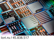 Silicon semiconductor wafer close-up. In electronics, a wafer also called a slice or substrate is a thin slice of semiconductor, a crystalline silicon, used for the fabrication of integrated circuits. Стоковое фото, фотограф Андрей Армягов / Фотобанк Лори