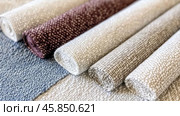 Boucle Fabric samples in various neutral colors close up arranged, texture detail, interior design palette background. Стоковое AI-изображение, AI-художник Анастасия Золотницкая / Фотобанк Лори