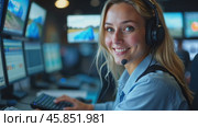 Young Woman Working in a Control Room While Using a Headset and Smiling at the Camera During a Busy Workday. Стоковое AI-видео, аниматор Sergey Grishin / Фотобанк Лори