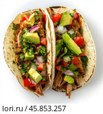 Delicious carnitas tacos garnished with cilantro, avocado, tomato, and onion on white background. Стоковое AI-изображение, AI-художник Иван Рябоконь / Фотобанк Лори