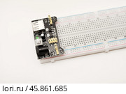 A solderless breadboard for electronics. An assembly tool for radio amateurs. Стоковое фото, фотограф Valeriy Lushchikov / Фотобанк Лори