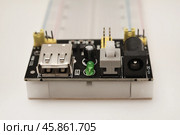 A solderless breadboard for electronics. An assembly tool for radio amateurs. Стоковое фото, фотограф Valeriy Lushchikov / Фотобанк Лори
