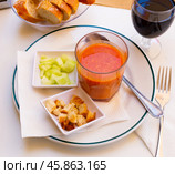 Refreshing tomato pureed soup Gazpacho with toasted bread and cucumbers. Стоковое фото, фотограф Яков Филимонов / Фотобанк Лори