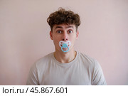 Мужчина с соской во рту. Стоковое AI-изображение, AI-художник Дмитрий Киселёв / Фотобанк Лори