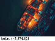 Cargo vessels and containers at a busy port with cranes in action. Стоковое AI-изображение, AI-художник Михаил Коханчиков / Фотобанк Лори