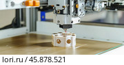 3d printer creating plastic prototype in laboratory. Стоковое AI-изображение, AI-художник Юрий Поздников / Фотобанк Лори