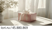 Elegant Valentines day gift box with ribbon on sunlit table. Стоковое AI-изображение, AI-художник Lamina Akulova / Фотобанк Лори