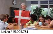 in geography lesson, students study largest country in eastern hemisphere - Denmark. Стоковое видео, видеограф Яков Филимонов / Фотобанк Лори