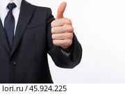 Businessman showing thumbs up sign approving and agreeing. Стоковое AI-изображение, AI-художник Иван Рябоконь / Фотобанк Лори