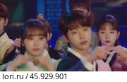 K Pop group performing in traditional Korean clothing. Стоковое видео, видеограф Данил Руденко / Фотобанк Лори