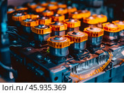 Electric car lithium battery pack closeup showing cylindrical cells. Стоковое AI-изображение, AI-художник Иван Рябоконь / Фотобанк Лори