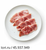 Coppa slices seasoned with salt and pepper on white plate. Стоковое AI-изображение, AI-художник Иван Рябоконь / Фотобанк Лори