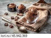 Sweet dessert. The love of ice cream. Balls of chocolate ice cream in a creamer. Ice cream day. Banner, advertisement. Стоковое AI-изображение, AI-художник Photojuli / Фотобанк Лори