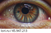 Close up of a man eye gradually opening to reveal intricate iris details. Стоковое видео, видеограф Данил Руденко / Фотобанк Лори