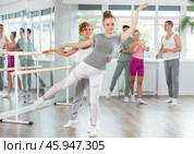Ballet training for teenagers in a ballet studio under the guidance of choreographer. Стоковое фото, фотограф Яков Филимонов / Фотобанк Лори