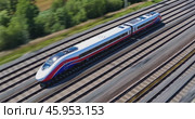modern high-speed train moves quickly on rails, top view. Стоковое AI-видео, аниматор Александр Довянский / Фотобанк Лори