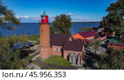 Polessk, Kaliningrad region, Russia, September 04, 2022 Old lighthouse in the village Zalivino. Редакционное фото, фотограф Наталья Симакова / Фотобанк Лори